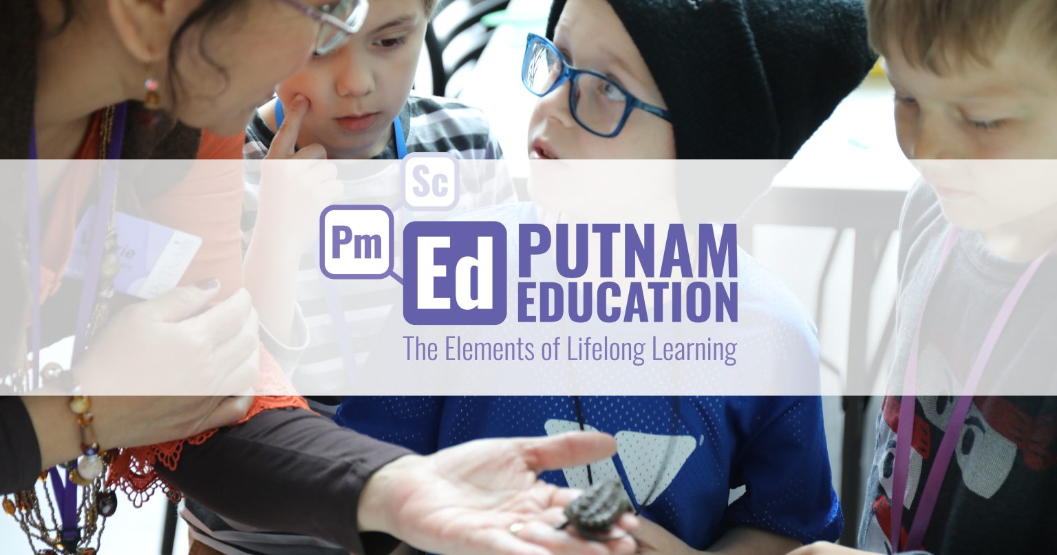 Putnam Education: The Elements of Lifelong Learning, featuring a Putnam Educator showing a group of children a small turtle in her hand.